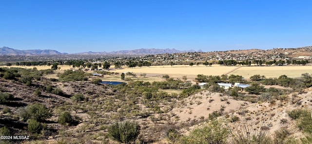 property view of mountains featuring a rural view