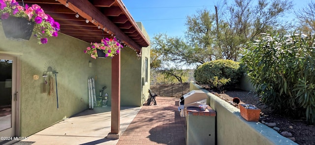 view of patio with area for grilling