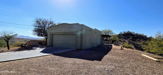 garage featuring a mountain view