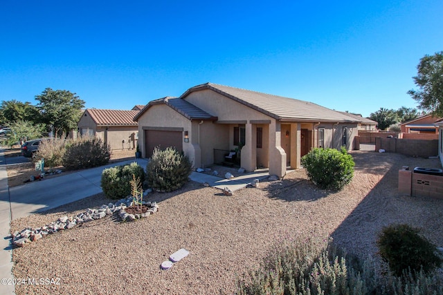 single story home featuring a garage