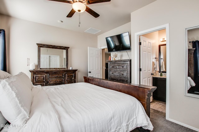 bedroom featuring ceiling fan, carpet floors, and ensuite bath