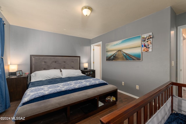 bedroom featuring dark wood-type flooring