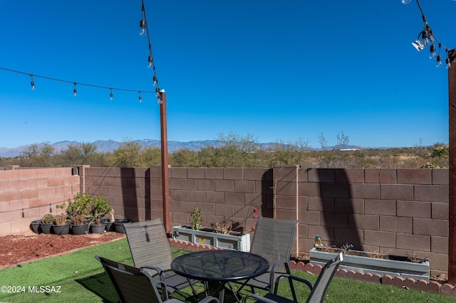 view of patio with a mountain view