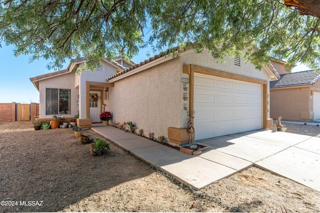 view of front of home with a garage