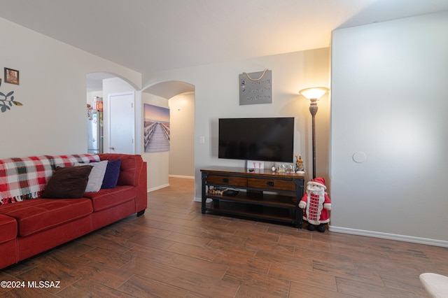 living room featuring dark hardwood / wood-style floors