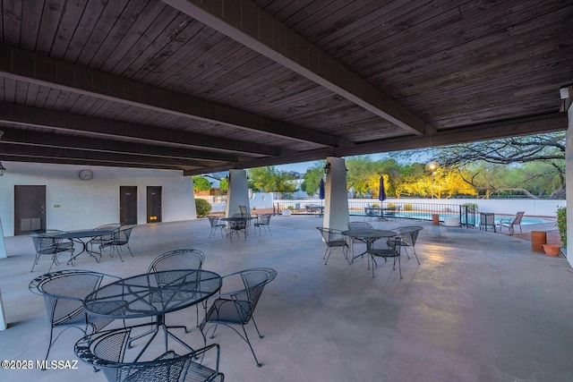 view of patio / terrace featuring fence