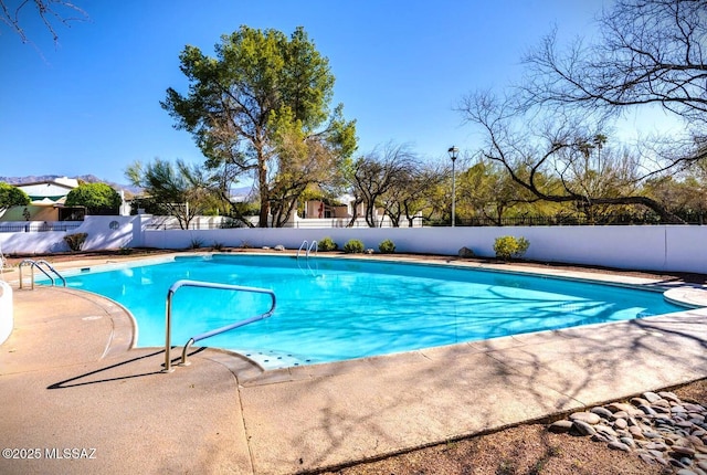 view of pool featuring fence and a fenced in pool