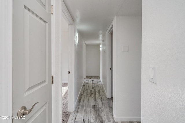 hallway featuring light wood-type flooring