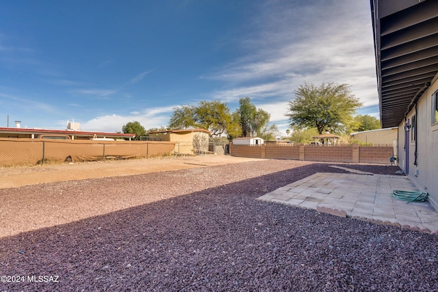 view of yard with a patio area