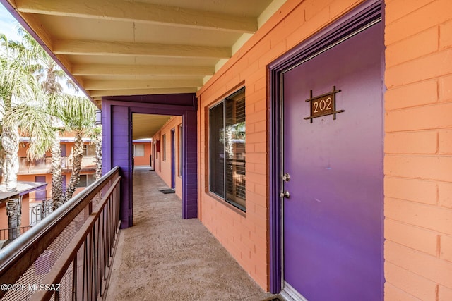 property entrance with a balcony