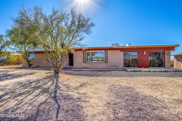 view of front of property with a patio