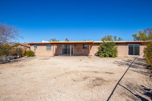 rear view of property with a patio