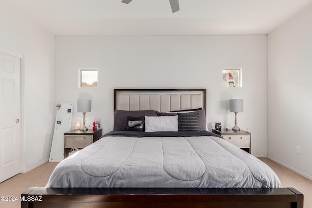 misc room featuring ceiling fan and light colored carpet