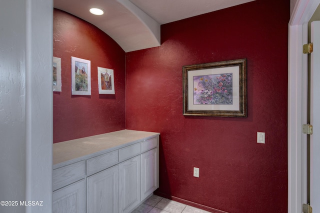 bathroom with tile patterned flooring