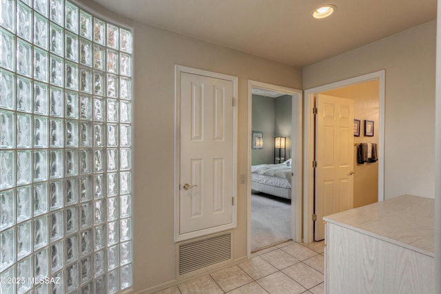 interior space featuring light tile patterned floors