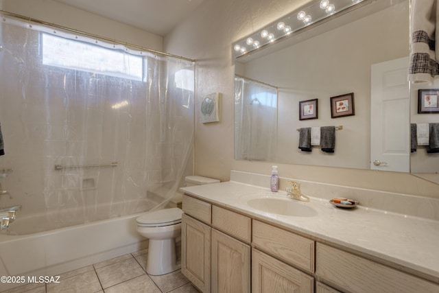 full bathroom featuring tile patterned floors, vanity, toilet, and shower / tub combo with curtain