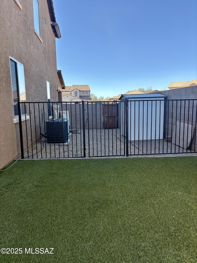 view of yard with central AC