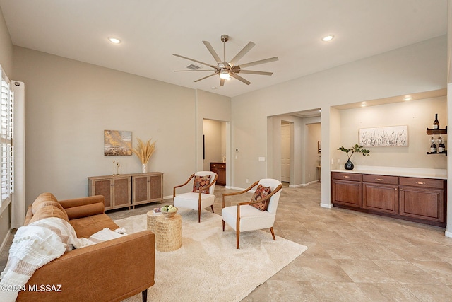 living room featuring ceiling fan