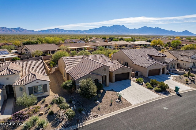 bird's eye view with a mountain view