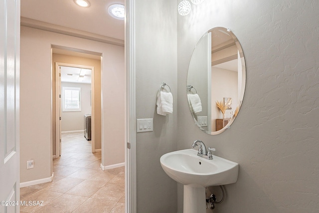 bathroom with tile patterned floors and sink