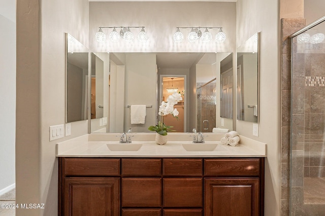 bathroom with vanity and an enclosed shower