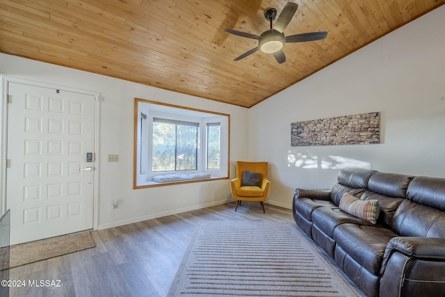 unfurnished living room featuring hardwood / wood-style flooring, vaulted ceiling, ceiling fan, and wooden ceiling