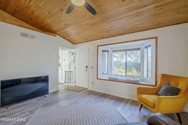 unfurnished room featuring wooden ceiling, light hardwood / wood-style floors, ceiling fan, and lofted ceiling