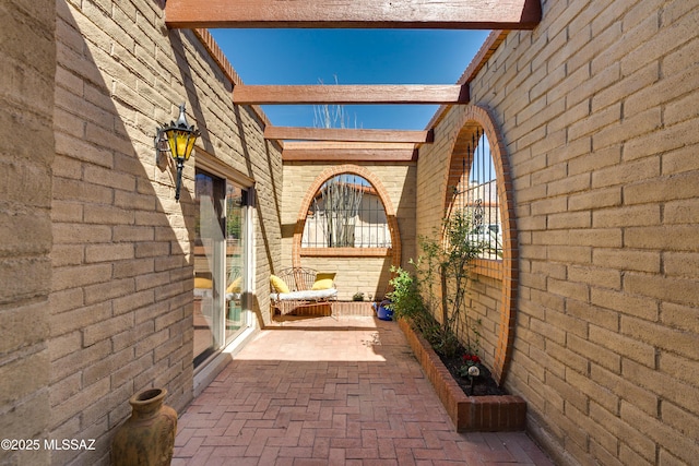 view of patio / terrace featuring fence