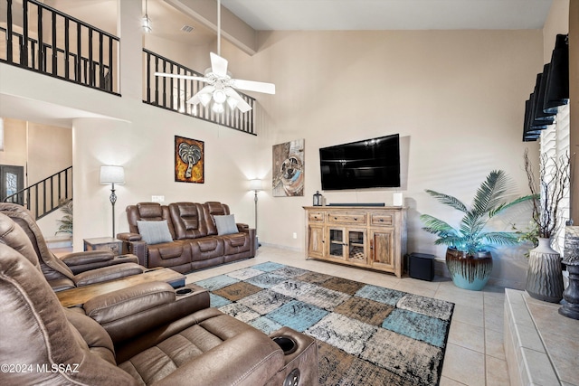 living room with tile patterned flooring, ceiling fan, and high vaulted ceiling