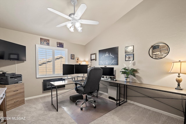 office space with ceiling fan, carpet floors, and lofted ceiling