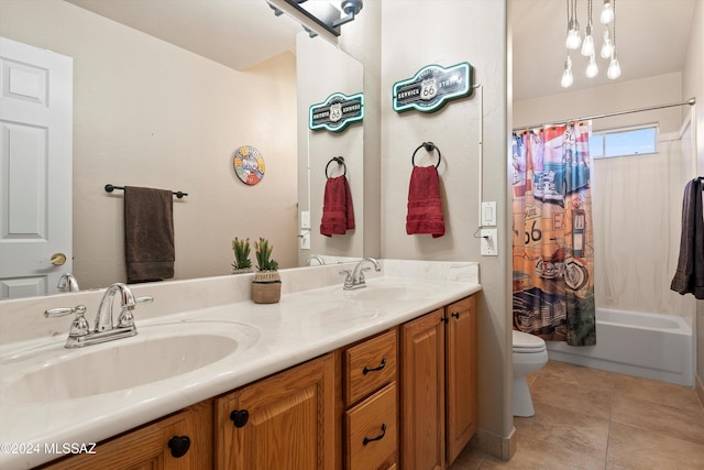 full bathroom featuring tile patterned flooring, vanity, toilet, and shower / bath combo with shower curtain