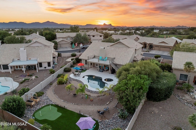 aerial view at dusk with a mountain view