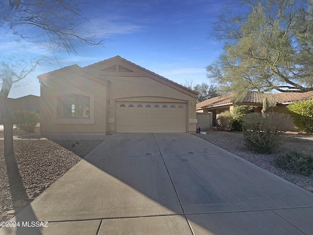 view of front of home featuring a garage