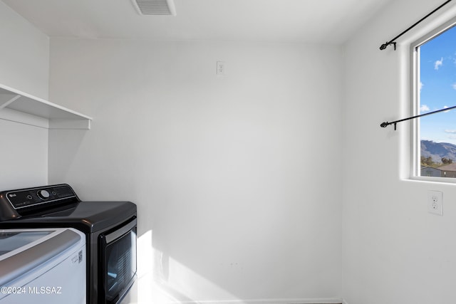 laundry area featuring separate washer and dryer