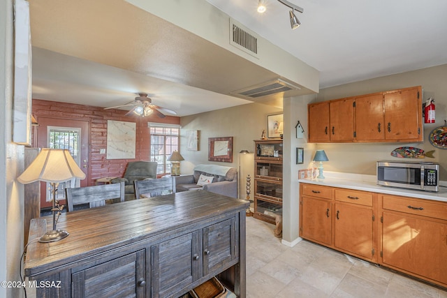 kitchen featuring ceiling fan