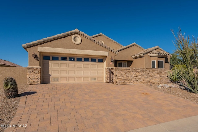 view of front of property featuring a garage