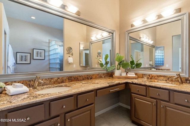 bathroom with vanity and tile patterned floors