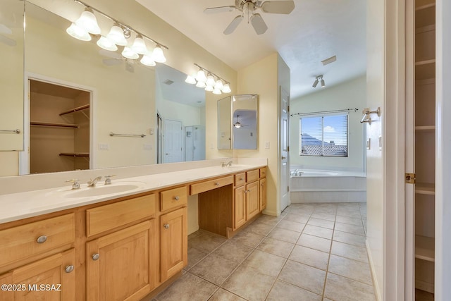 bathroom with vanity, plus walk in shower, vaulted ceiling, tile patterned flooring, and ceiling fan