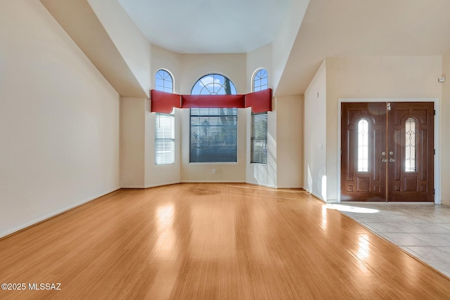 entrance foyer with light hardwood / wood-style floors