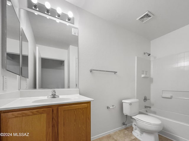 full bathroom featuring tile patterned flooring, vanity, toilet, and shower / washtub combination