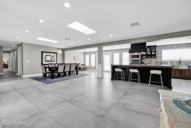 dining room featuring sink