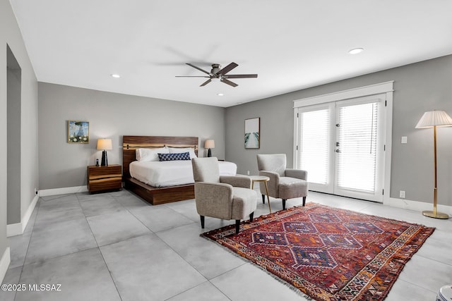 bedroom with access to exterior, french doors, and ceiling fan