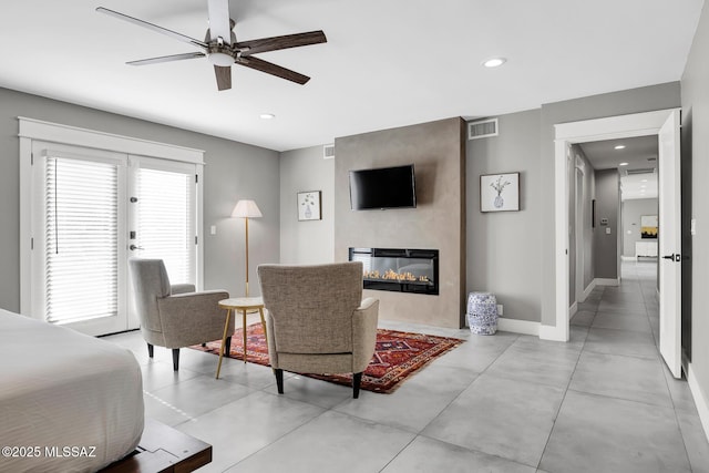 living room featuring ceiling fan