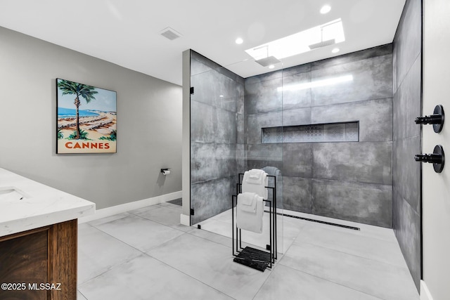 bathroom featuring vanity and walk in shower