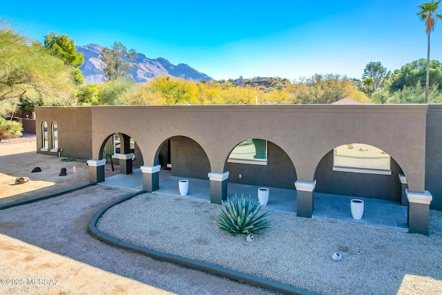 view of front facade featuring a mountain view