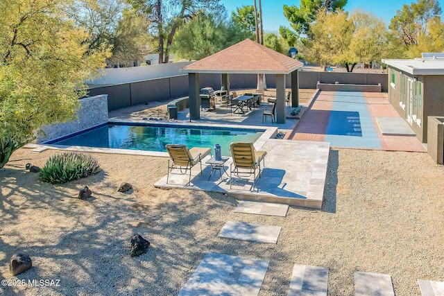 view of pool featuring a gazebo and a patio