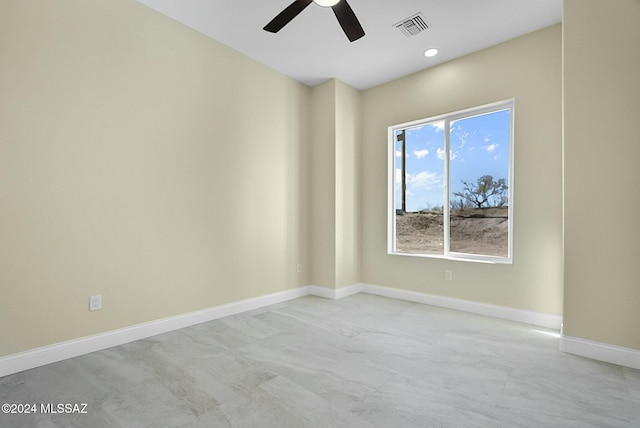 spare room featuring ceiling fan