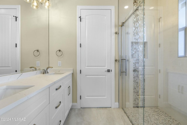 bathroom featuring vanity and walk in shower