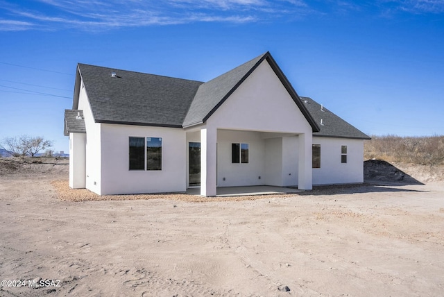 back of house featuring a patio