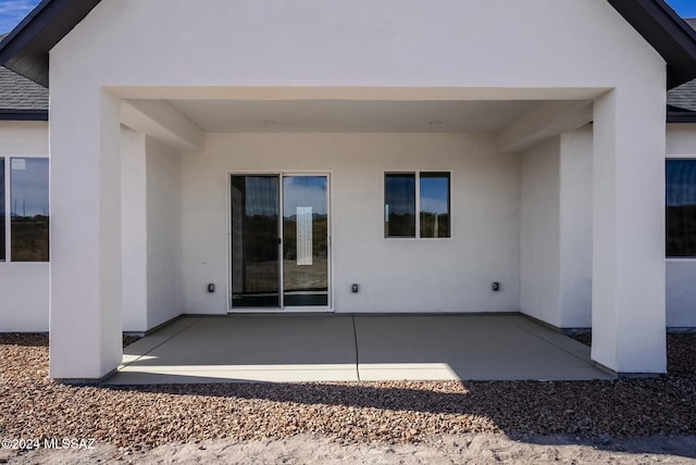 back of house featuring a patio